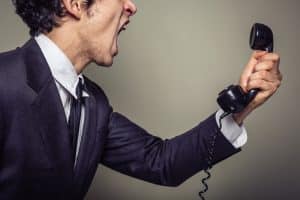 Angry businessman on the phone